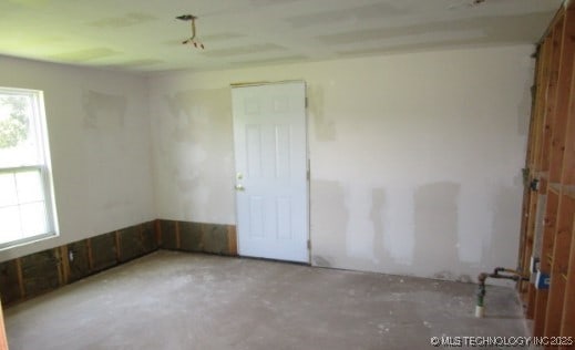 13290 S 4230th Rd, Claremore, OK 74017 - empty room featuring concrete flooring