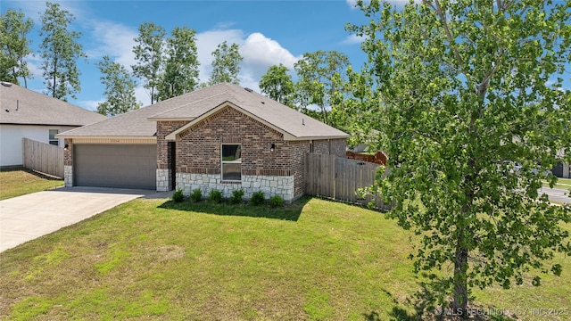 3324 N 23rd W Ave, Tulsa, OK 74127 - view of front of property with brick siding, an attached garage, roof with shingles, and driveway