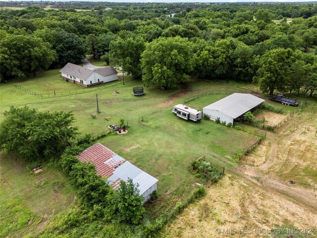 616 S Schlegel, Cushing, OK 74023 - aerial view of sparsely populated area featuring a heavily wooded area