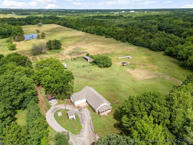 616 S Schlegel, Cushing, OK 74023 - aerial view of sparsely populated area featuring a heavily wooded area