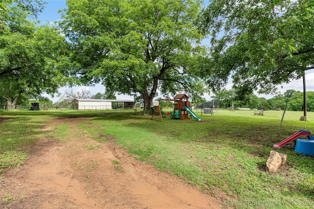 616 S Schlegel, Cushing, OK 74023 - view of yard with a playground
