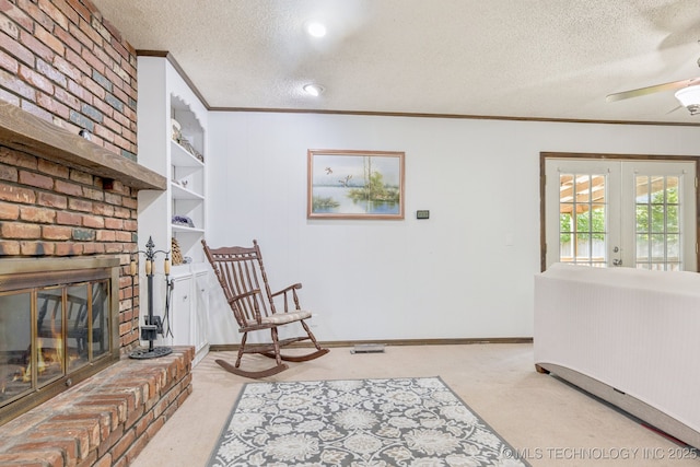 1110 S Division St, Sapulpa, OK 74066 - sitting room with crown molding, a textured ceiling, french doors, light carpet, and ceiling fan