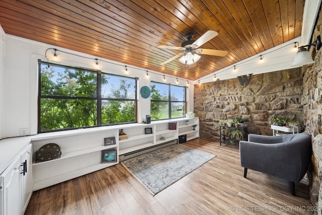 12350 E 138th St S, Broken Arrow, OK 74011 - sitting room with a baseboard radiator, wooden ceiling, track lighting, a ceiling fan, and wood finished floors