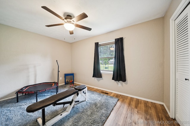 12350 E 138th St S, Broken Arrow, OK 74011 - recreation room featuring ceiling fan, wood finished floors, and baseboards
