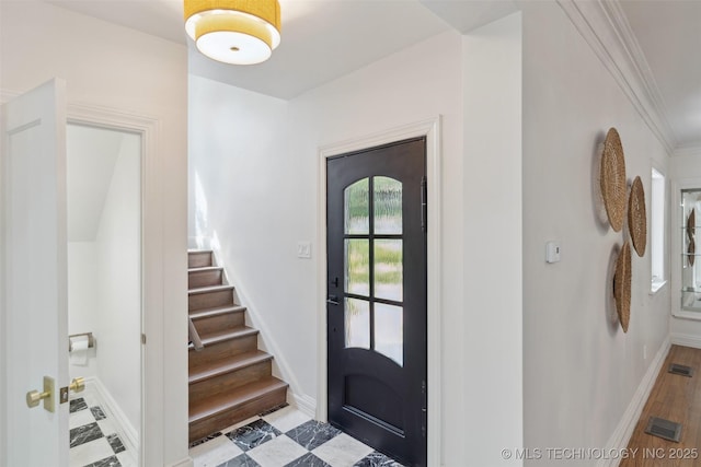 302 E 29th St, Tulsa, OK 74114 - entryway with baseboards, stairway, and crown molding