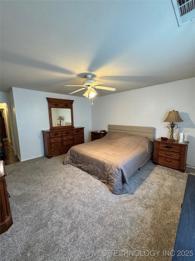 509 W Ryan St, Catoosa, OK 74015 - bedroom featuring carpet flooring and a ceiling fan