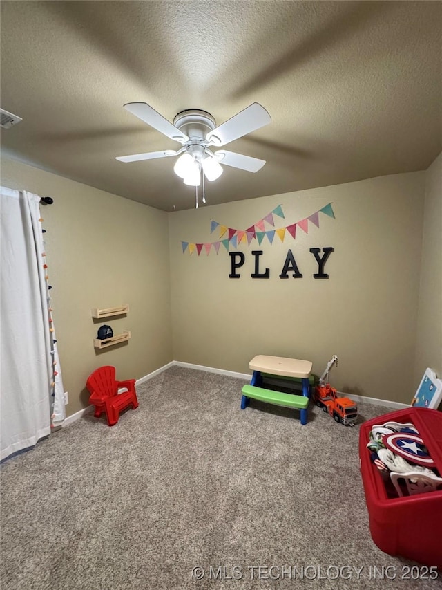 509 W Ryan St, Catoosa, OK 74015 - rec room featuring carpet flooring, a ceiling fan, a textured ceiling, and baseboards