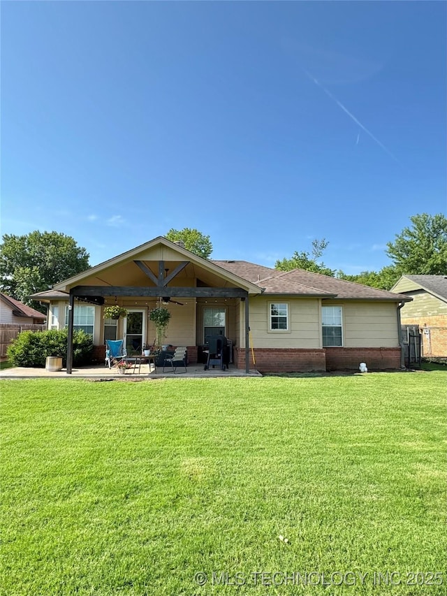 509 W Ryan St, Catoosa, OK 74015 - back of house featuring a ceiling fan, a patio, and brick siding