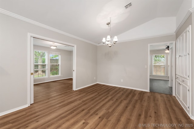 4908 S Redbud Ave, Broken Arrow, OK 74011 - unfurnished room with wood finished floors, a chandelier, baseboards, ornamental molding, and lofted ceiling