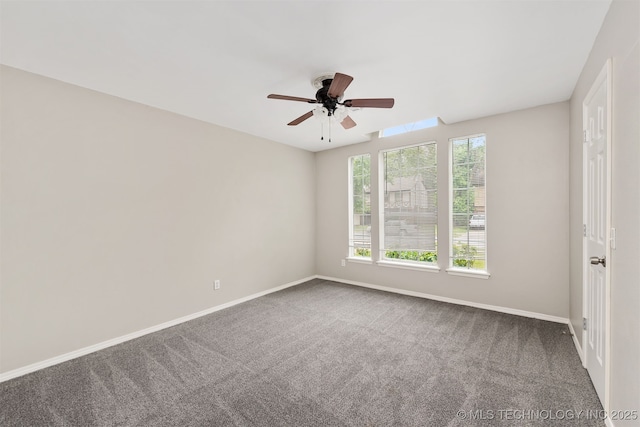 4908 S Redbud Ave, Broken Arrow, OK 74011 - carpeted spare room with a ceiling fan and baseboards
