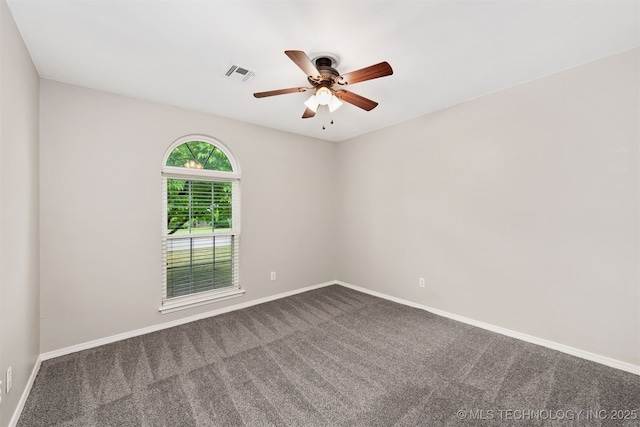 4908 S Redbud Ave, Broken Arrow, OK 74011 - spare room with dark carpet, baseboards, and ceiling fan