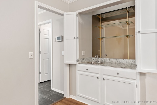 4908 S Redbud Ave, Broken Arrow, OK 74011 - bathroom featuring vanity, baseboards, and tile patterned flooring