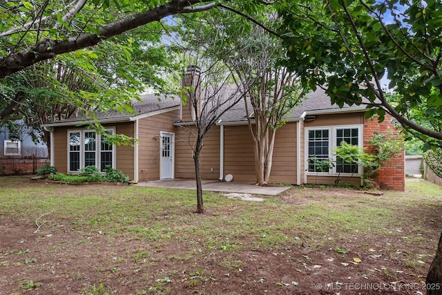 4908 S Redbud Ave, Broken Arrow, OK 74011 - rear view of property with a patio area, a chimney, and a shingled roof