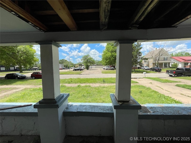 1114 S Keeler Ave, Bartlesville, OK 74003 - covered porch featuring a residential view and a yard