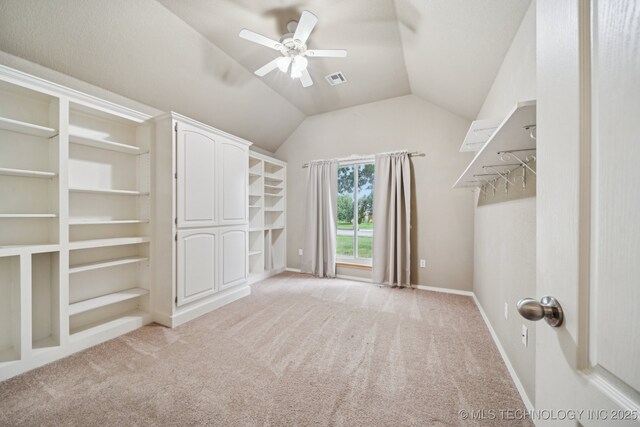 109 W 133rd Pl, Skiatook, OK 74070 - walk in closet with ceiling fan, lofted ceiling, and light carpet