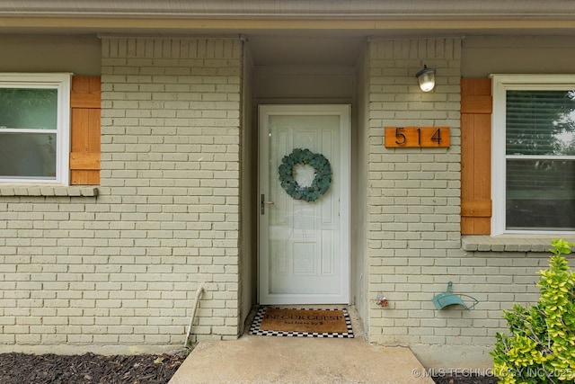 514 N Village Pl, Broken Arrow, OK 74012 - view of exterior entry with brick siding