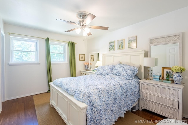 514 N Village Pl, Broken Arrow, OK 74012 - bedroom with dark wood finished floors, a ceiling fan, and baseboards