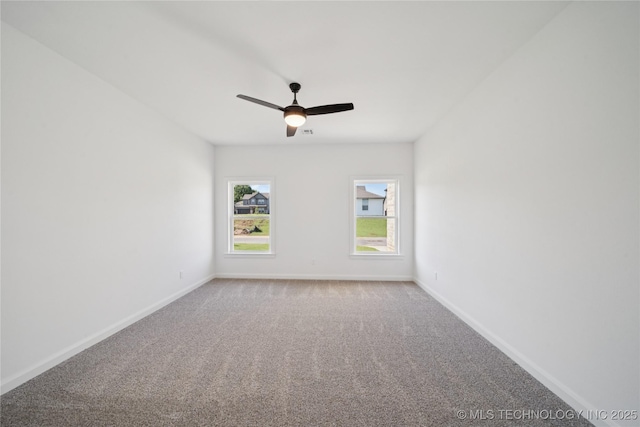 2410 W Charleston St, Broken Arrow, OK 74011 - carpeted spare room featuring baseboards and ceiling fan