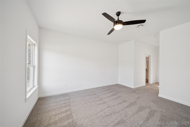 2410 W Charleston St, Broken Arrow, OK 74011 - carpeted spare room with baseboards and a ceiling fan