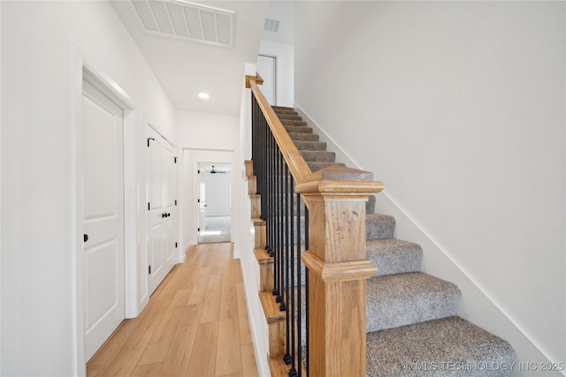 2410 W Charleston St, Broken Arrow, OK 74011 - stairs with wood finished floors and recessed lighting