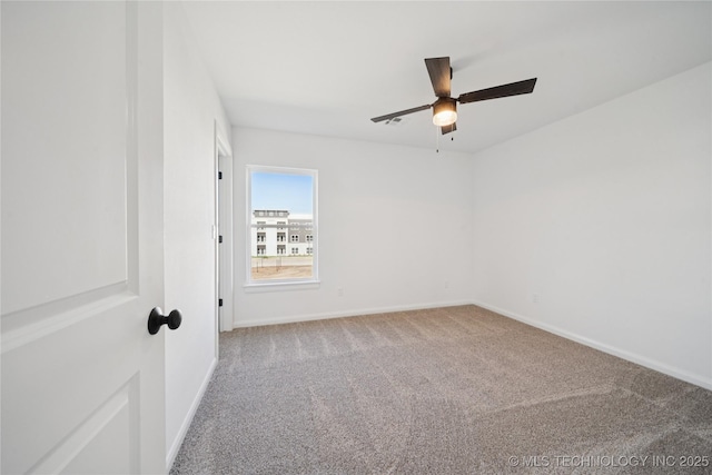 2410 W Charleston St, Broken Arrow, OK 74011 - spare room featuring ceiling fan, carpet floors, and baseboards