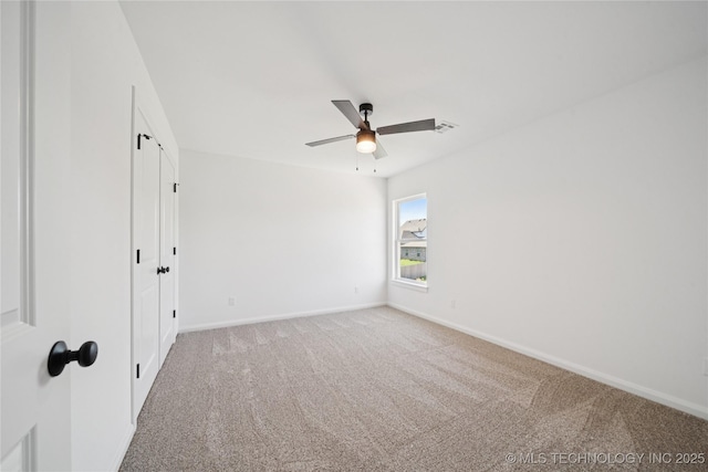 2410 W Charleston St, Broken Arrow, OK 74011 - spare room with ceiling fan, light carpet, and baseboards