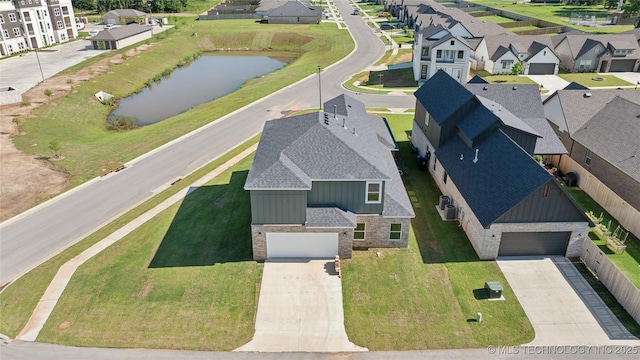 2410 W Charleston St, Broken Arrow, OK 74011 - aerial view of residential area with a nearby body of water