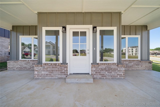 2410 W Charleston St, Broken Arrow, OK 74011 - entrance to property with board and batten siding