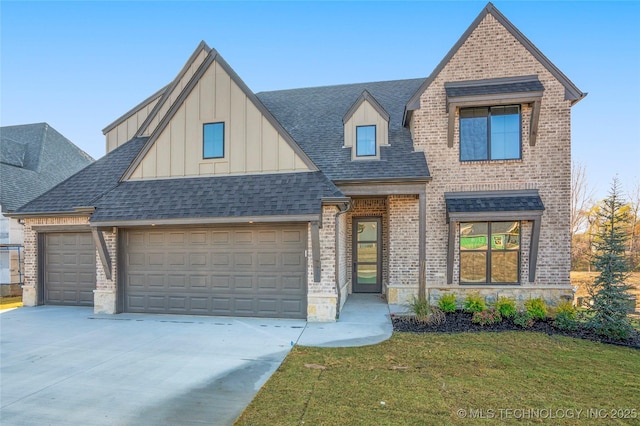 2332 E 135th Dr S, Bixby, OK 74008 - view of front of property featuring concrete driveway, brick siding, roof with shingles, board and batten siding, and a front yard