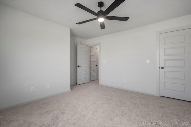 2332 E 135th Dr S, Bixby, OK 74008 - unfurnished bedroom featuring carpet flooring, baseboards, and ceiling fan