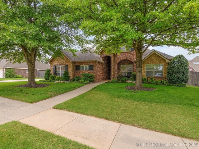 5816 Woodland Rd, Bartlesville, OK 74006 - traditional-style home with brick siding