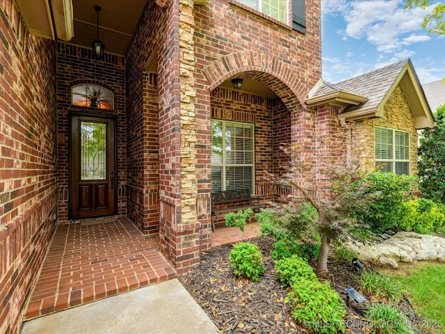 5816 Woodland Rd, Bartlesville, OK 74006 - property entrance with brick siding