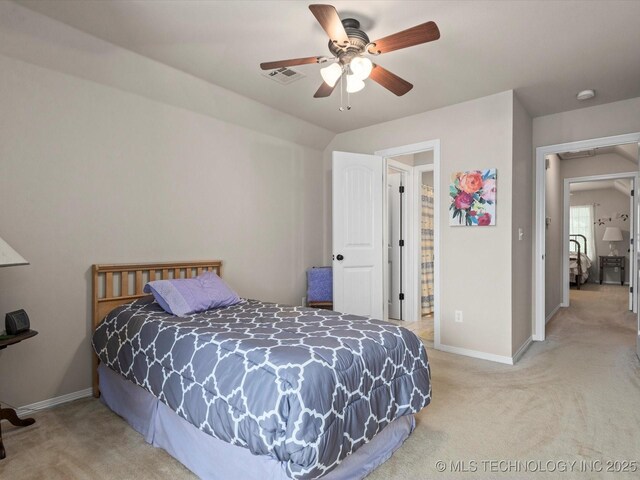 5816 Woodland Rd, Bartlesville, OK 74006 - bedroom with carpet floors and a ceiling fan