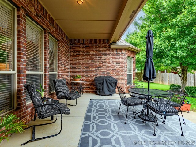 5816 Woodland Rd, Bartlesville, OK 74006 - view of patio with area for grilling and outdoor dining space