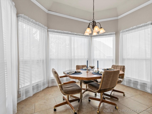 5816 Woodland Rd, Bartlesville, OK 74006 - dining area featuring ornamental molding, light tile patterned flooring, and a chandelier
