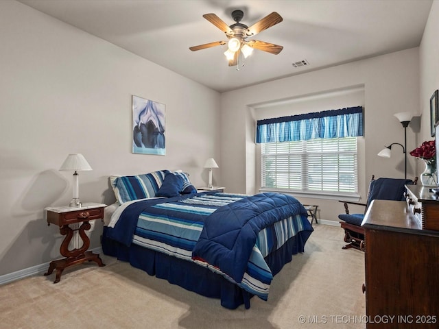 5816 Woodland Rd, Bartlesville, OK 74006 - carpeted bedroom with baseboards and a ceiling fan