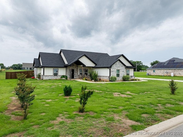 40 Wilson Pkwy, Durant, OK 74701 - view of front of home featuring a shingled roof and board and batten siding