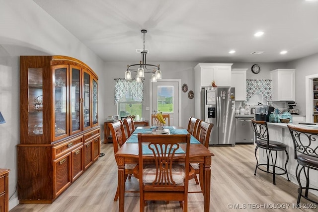 40 Wilson Pkwy, Durant, OK 74701 - dining space featuring a chandelier, light wood-style floors, and recessed lighting