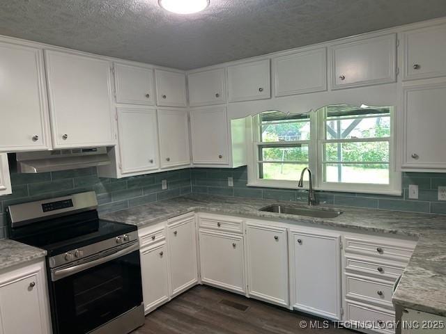 111 E 13th Pl, Claremore, OK 74017 - kitchen featuring stainless steel range with electric stovetop, a sink, under cabinet range hood, white cabinets, and dark wood-style flooring