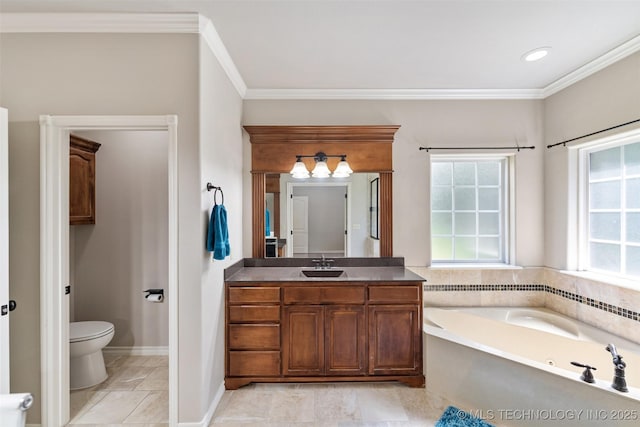 18932 Spring Creek Ln, Claremore, OK 74017 - bathroom with vanity, a jetted tub, ornamental molding, toilet, and baseboards