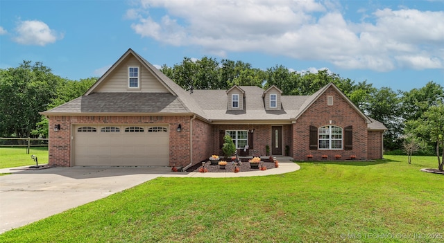 18932 Spring Creek Ln, Claremore, OK 74017 - view of front facade featuring brick siding, a front lawn, driveway, and roof with shingles