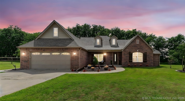 18932 Spring Creek Ln, Claremore, OK 74017 - view of front of home featuring brick siding, driveway, an attached garage, and a shingled roof