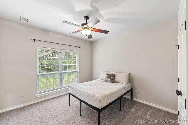 18932 Spring Creek Ln, Claremore, OK 74017 - bedroom with carpet floors, baseboards, and a ceiling fan