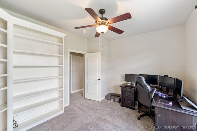 18932 Spring Creek Ln, Claremore, OK 74017 - carpeted home office with a ceiling fan and baseboards