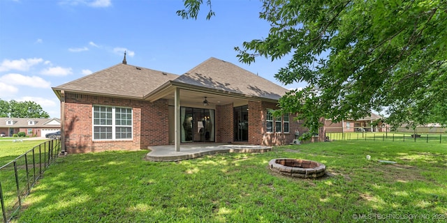 18932 Spring Creek Ln, Claremore, OK 74017 - rear view of property featuring an outdoor fire pit, ceiling fan, a patio, brick siding, and a shingled roof