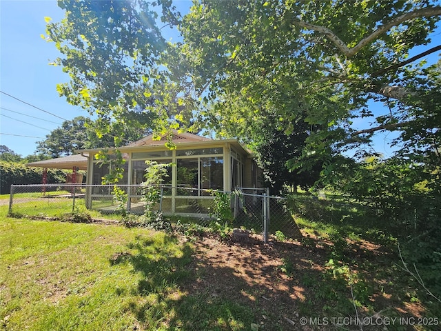 2700 N Witte St, Poteau, OK 74953 - view of yard with a sunroom and an attached carport