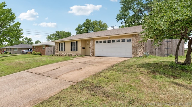 4964 SE Brookline Dr, Bartlesville, OK 74006 - single story home with a garage, stone siding, and concrete driveway