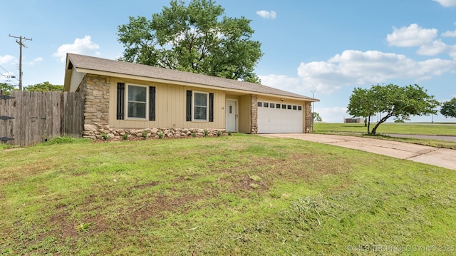 4964 SE Brookline Dr, Bartlesville, OK 74006 - ranch-style home with concrete driveway, a garage, and stone siding