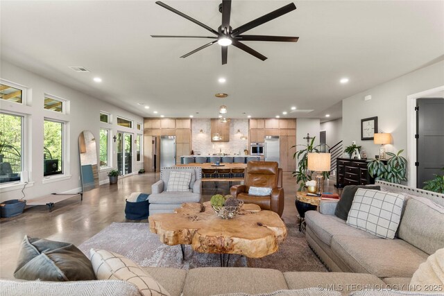 8562 Adams Creek Rd, Beggs, OK 74421 - living room with ceiling fan and recessed lighting