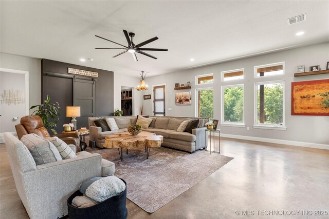 8562 Adams Creek Rd, Beggs, OK 74421 - living room featuring concrete floors, baseboards, ceiling fan, and recessed lighting